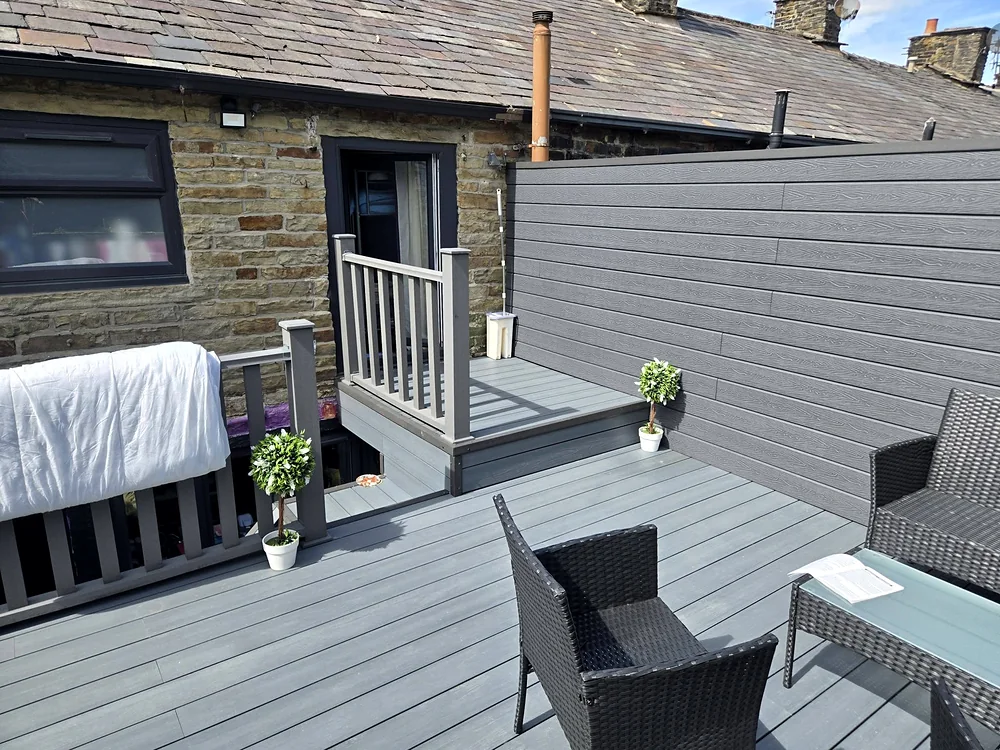 Composite deck outside the back door with a new balustrade